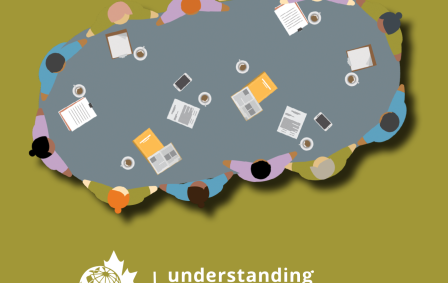 image of people around a table working together holding hands