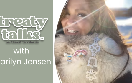 Marilyn Jensen wearing a fun ruff with Treaty Talks NWT logo